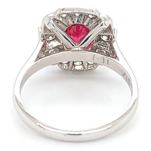 183 - 18k white gold Ruby and Diamond ring, 1.11ct oval ruby centre and 0.46ct diamonds surrounding, size ... 