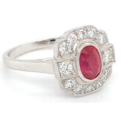 183 - 18k white gold Ruby and Diamond ring, 1.11ct oval ruby centre and 0.46ct diamonds surrounding, size ... 