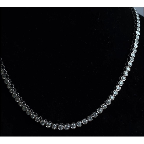 345 - A gorgeous 10ct round diamond tennis necklace, set in 18k white gold, 43cm long, brand new condition... 