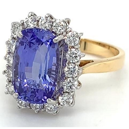 380 - 18k yellow gold Tanzanite and Diamond ring, 4.15ct cushion cut Tanzanite centre stone, and 0.63ct di... 