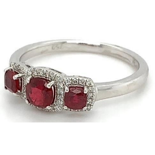 473 - 18k white gold Ruby and Diamond ring, 0.72ct of 3 stones set ruby and 0.11ct diamonds halo setting, ... 