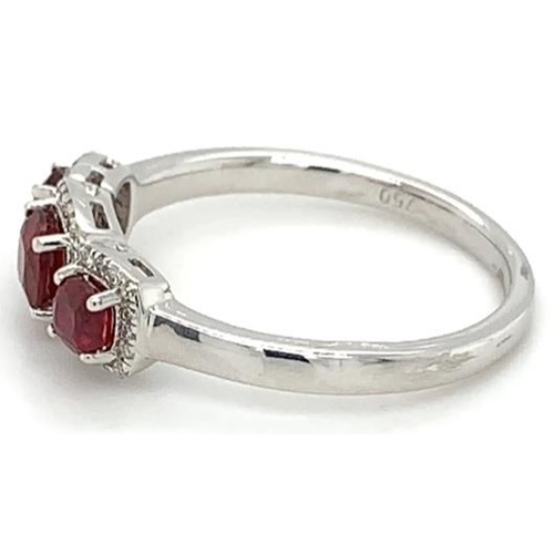 473 - 18k white gold Ruby and Diamond ring, 0.72ct of 3 stones set ruby and 0.11ct diamonds halo setting, ... 