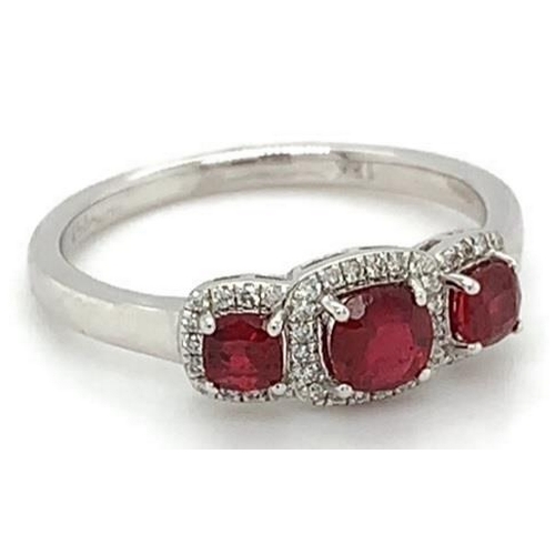 473 - 18k white gold Ruby and Diamond ring, 0.72ct of 3 stones set ruby and 0.11ct diamonds halo setting, ... 