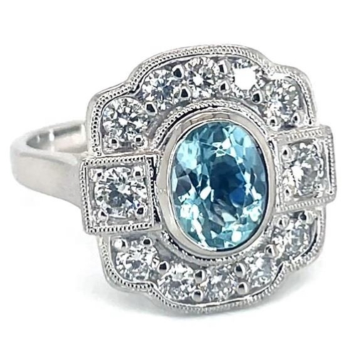 646 - Platinum Aquamarine and Diamond ring, 1.10ct oval aquamarine centre stone, 0.85ct diamonds surroundi... 