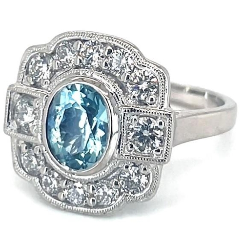 646 - Platinum Aquamarine and Diamond ring, 1.10ct oval aquamarine centre stone, 0.85ct diamonds surroundi... 