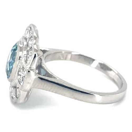 646 - Platinum Aquamarine and Diamond ring, 1.10ct oval aquamarine centre stone, 0.85ct diamonds surroundi... 