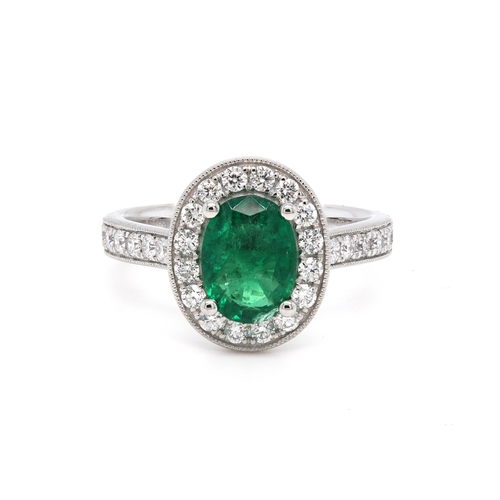 653 - Platinum Emerald and Diamond ring, 1.14ct oval green emerald centre stone, 0.47ct diamonds surroundi... 