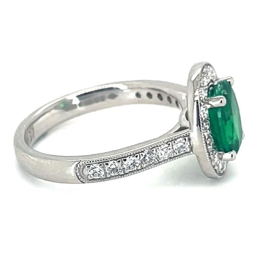 653 - Platinum Emerald and Diamond ring, 1.14ct oval green emerald centre stone, 0.47ct diamonds surroundi... 