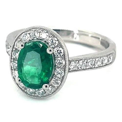 653 - Platinum Emerald and Diamond ring, 1.14ct oval green emerald centre stone, 0.47ct diamonds surroundi... 