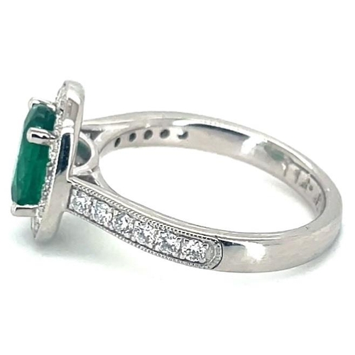 653 - Platinum Emerald and Diamond ring, 1.14ct oval green emerald centre stone, 0.47ct diamonds surroundi... 