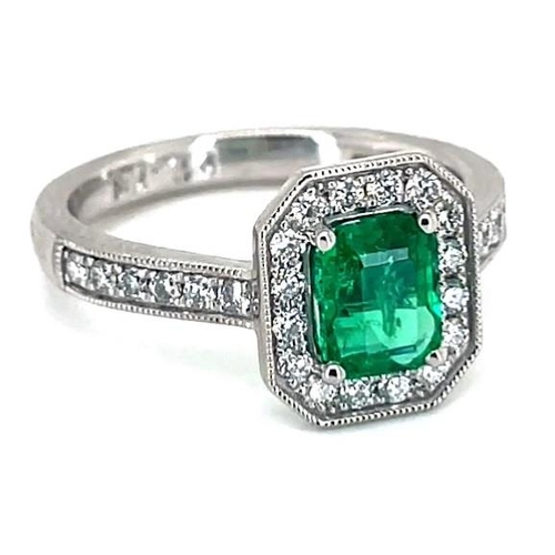 681 - Platinum Emerald and Diamond ring, 1ct square  green emerald centre stone, 0.31ct diamonds surroundi... 