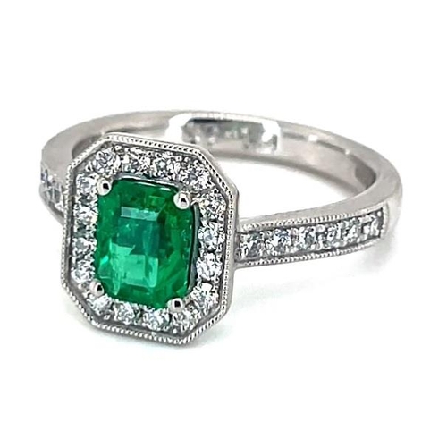 681 - Platinum Emerald and Diamond ring, 1ct square  green emerald centre stone, 0.31ct diamonds surroundi... 