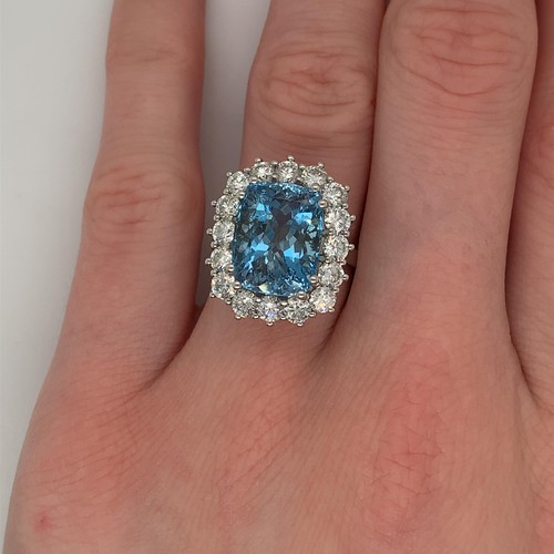 72 - Platinum Aquamarine and Diamond ring, 6.76ct cushion cut Aquamarine centre stone, and 1.16ct diamond... 