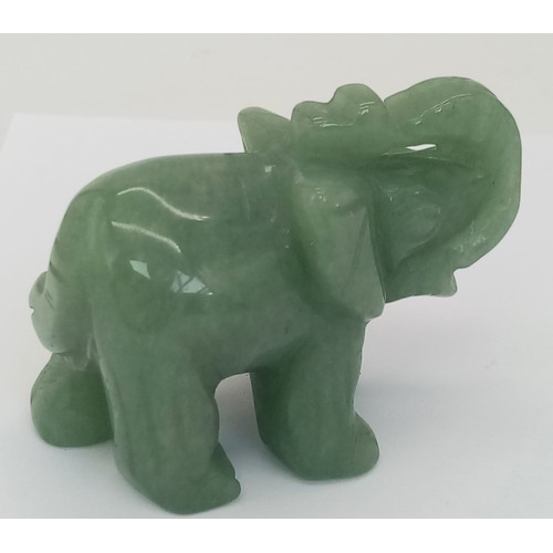 499 - A Wonderful Miniature Green Jade Elephant Figurine. 5cm x 4cm