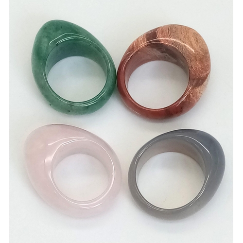 1124 - Four Different Coloured Gemstone Rings. Sizes: L, P, R and T.