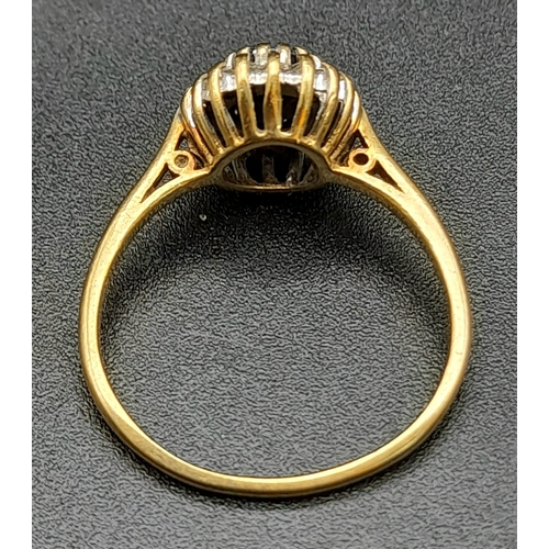 1289 - A Vintage 9K Yellow Gold Sapphire and Diamond Ring. Size N. 2.25g total weight.