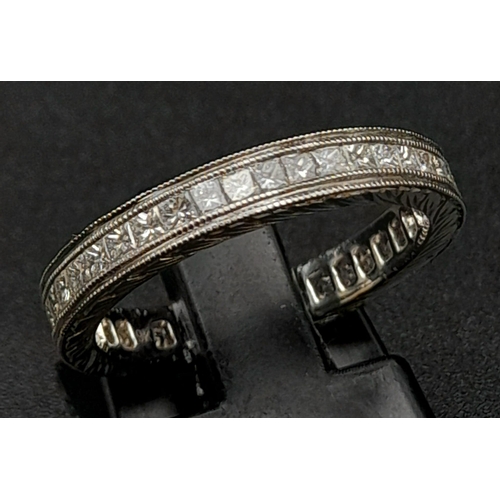 240 - A 9K White Gold Full-Eternity Diamond Ring. Size K. 1ct approx. 2.75g total weight.