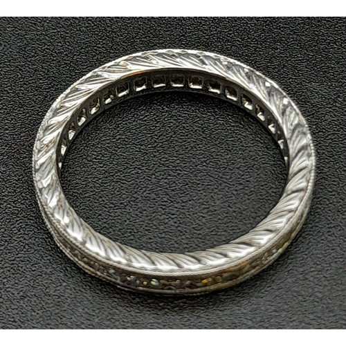 240 - A 9K White Gold Full-Eternity Diamond Ring. Size K. 1ct approx. 2.75g total weight.