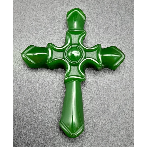 484 - A Green Jade Cross Pendant. 5 x 4cm