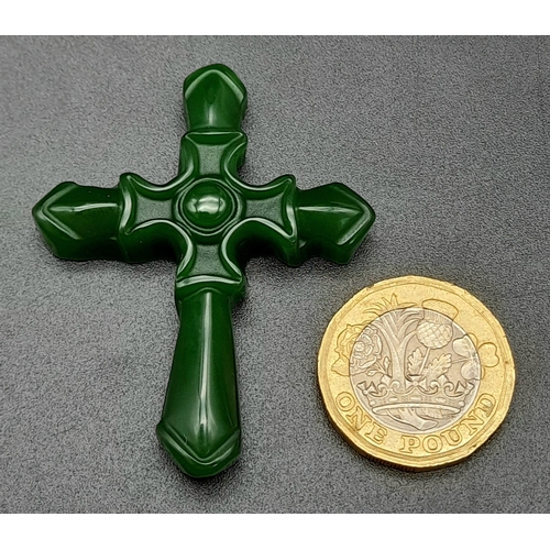 484 - A Green Jade Cross Pendant. 5 x 4cm