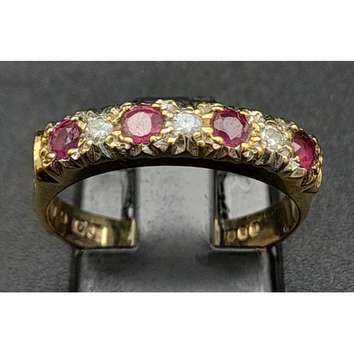 768 - 9K YELLOW GOLD DIAMOND & RUBY RING. TOTAL WEIGHT 2.5G SIZE N