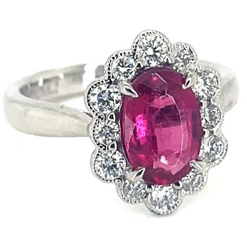 239 - Platinum Tourmaline and Diamond ring, 1.44ct oval pink tourmaline centre stone,  0.50ct diamonds sur... 