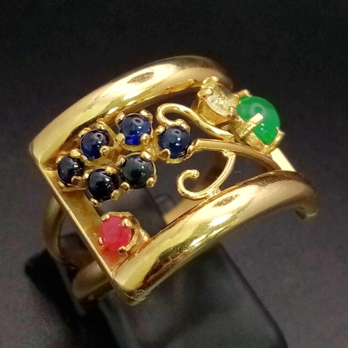 48 - An 18 K yellow gold ring with an artistic design and adorned with an emerald cabochon, plus ruby, di... 