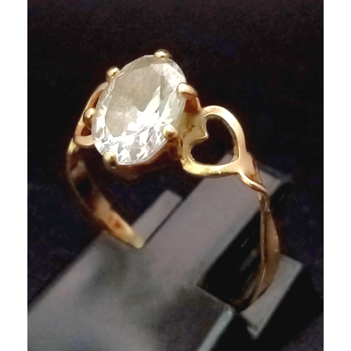 604 - A Vintage 9K Yellow Gold Heart CZ Ring. Size L 1/2. 1.36g total weight.