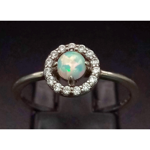 869 - 925 Silver and Fire Opal Ring. Total Weight 1.43Grams. Size N