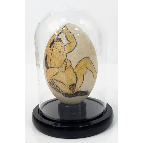 125 - A Japanese, hand painted, ostrich egg, depicting a humorous (and acrobatic) erotic scene after the f... 