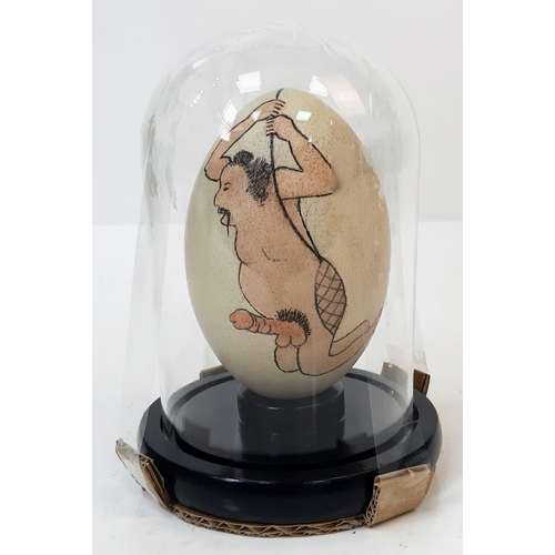 125 - A Japanese, hand painted, ostrich egg, depicting a humorous (and acrobatic) erotic scene after the f... 