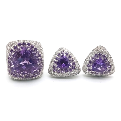 120 - A FABULOUS 18K WHITE GOLD DIAMOND AND AMETHYST RING WITH MATCHING EARRINGS .  35.5gms