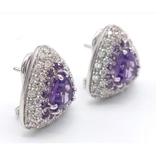 120 - A FABULOUS 18K WHITE GOLD DIAMOND AND AMETHYST RING WITH MATCHING EARRINGS .  35.5gms