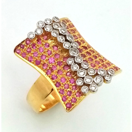 132 - A gorgeous 18 K yellow gold ring with dozens of rubies and diamonds. Ring size: M, weight: 10.1 g. A... 