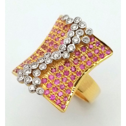 132 - A gorgeous 18 K yellow gold ring with dozens of rubies and diamonds. Ring size: M, weight: 10.1 g. A... 