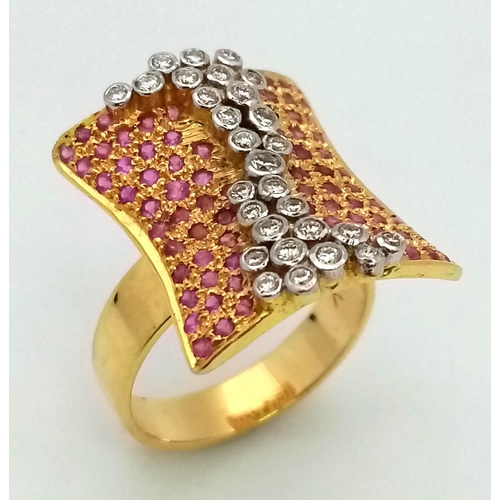 132 - A gorgeous 18 K yellow gold ring with dozens of rubies and diamonds. Ring size: M, weight: 10.1 g. A... 