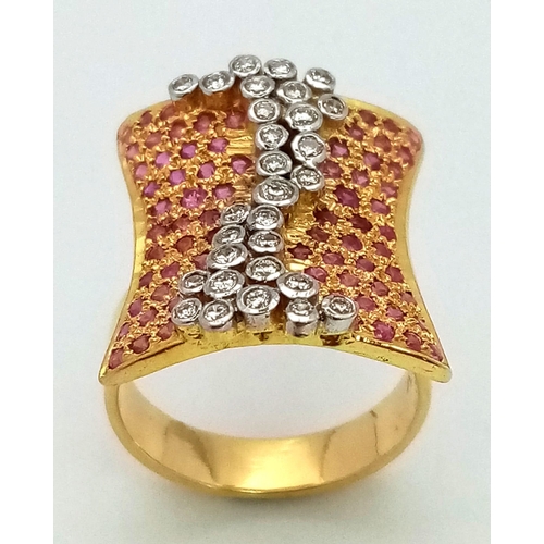 132 - A gorgeous 18 K yellow gold ring with dozens of rubies and diamonds. Ring size: M, weight: 10.1 g. A... 