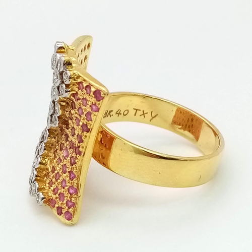 132 - A gorgeous 18 K yellow gold ring with dozens of rubies and diamonds. Ring size: M, weight: 10.1 g. A... 