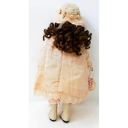 143 - A Vintage China Doll with Porcelain face and Hypnotic Blue Eyes, Victorian Lace Clothing and Lace Up... 