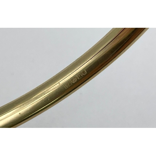 419 - A 9k Yellow Gold All Ended Bangle. 5.7g.