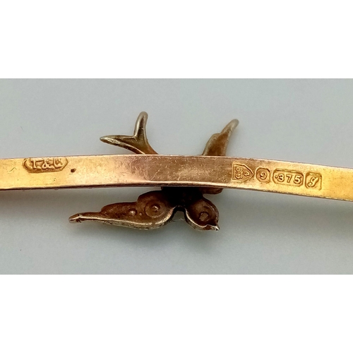 1618 - An Antique 9K Yellow Gold Bar Brooch with Bird and Seed Pearl Decoration. 4.5cm. 1.4g total weight.