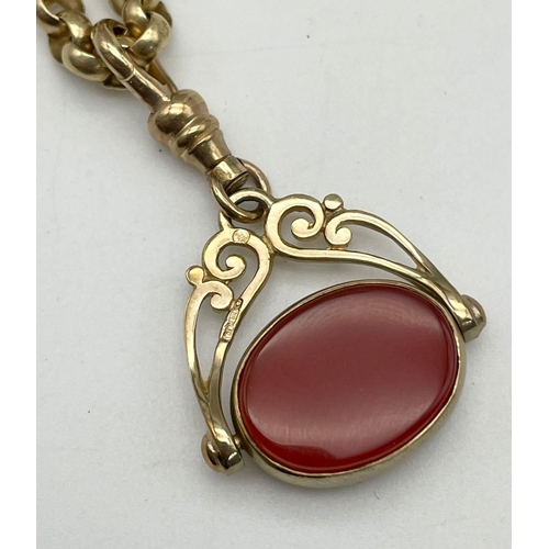 17 - An Antique 9K Gold, Carnelian and Black Onyx Spinning Fob Pendant on a 9K Yellow Gold Chain. 3cm and... 