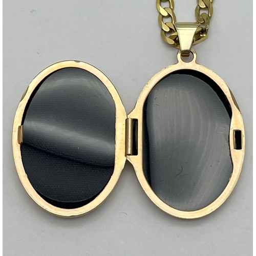 22 - A 9K Yellow Gold Oval Locket Pendant on a 9K Yellow Gold Flat Belcher Link Necklace. 3.5cm and 44cm.... 