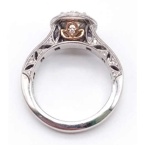 74 - A STUNNING 18K WHITE GOLD DIAMOND RING WITH A BRIGHT CLEAR .8ct CENTRE STONE SURROUNDED BY A HALO OF... 