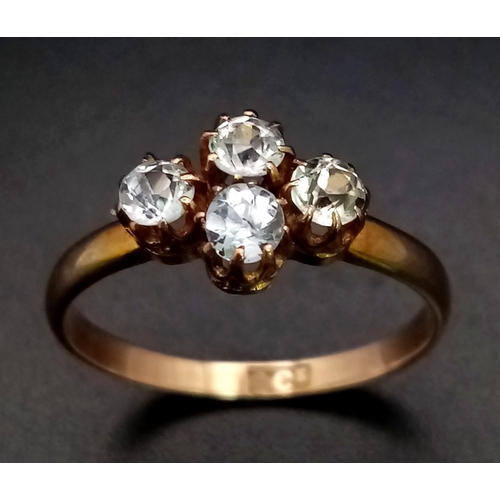 172 - 9k GOLD and stone set RING having four sparkling round cut stones  mounted to top, 1.92 grams. Size ... 