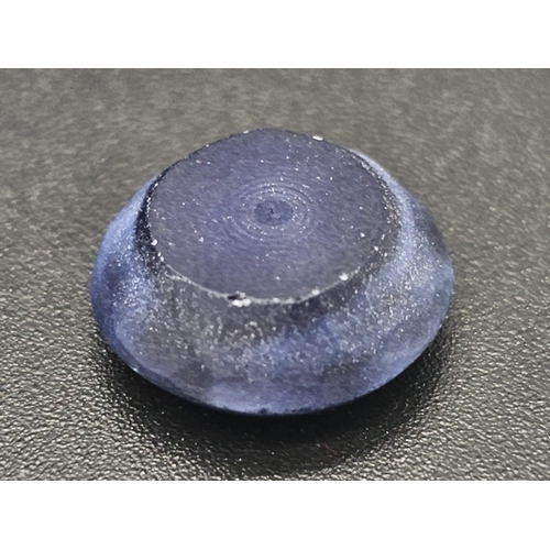 118 - A spectacular, blue STAR SAPPHIRE. Good size (10.50 carats), round cabochon (diameter: 13 mm). Due t... 