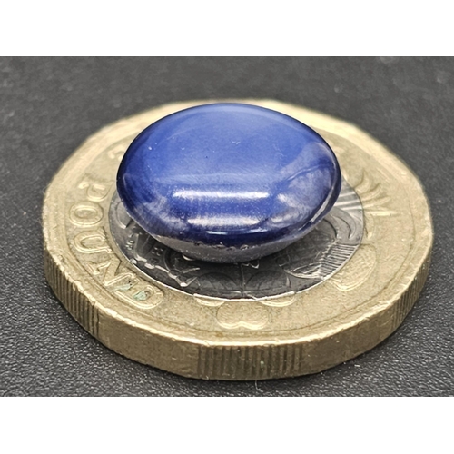 118 - A spectacular, blue STAR SAPPHIRE. Good size (10.50 carats), round cabochon (diameter: 13 mm). Due t... 