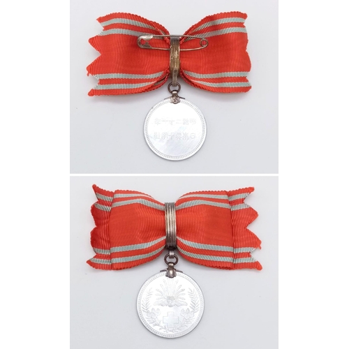 349 - WWII imperial Japanese army medal. Box is not original to this medal. Exceptionally fine condition r... 