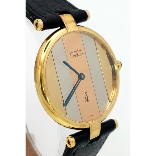 46 - A Cartier Must De Vermeil Tri Colour Unisex Watch. Black leather strap. Vermeil case - 32mm, with al... 