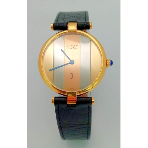 46 - A Cartier Must De Vermeil Tri Colour Unisex Watch. Black leather strap. Vermeil case - 32mm, with al... 